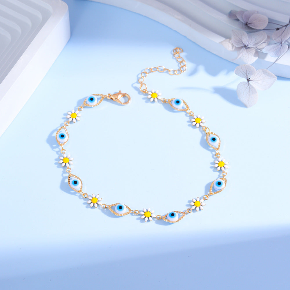 Eye Charm and Daisy Bracelet Bowlift