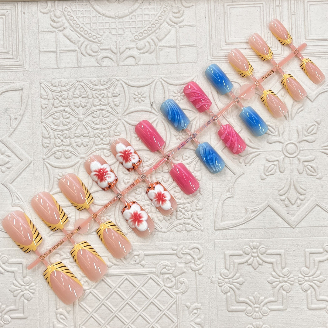 Artistic Press-On Nail Set with Floral and Wave Designs Bowlift