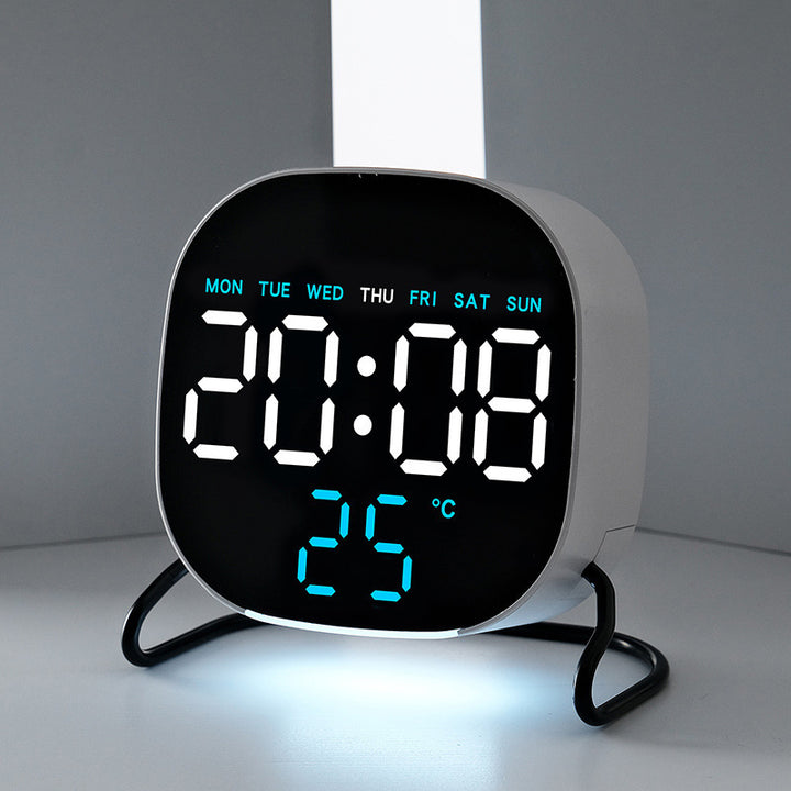 Digital alarm clock with temperature and calendar display Bowlift