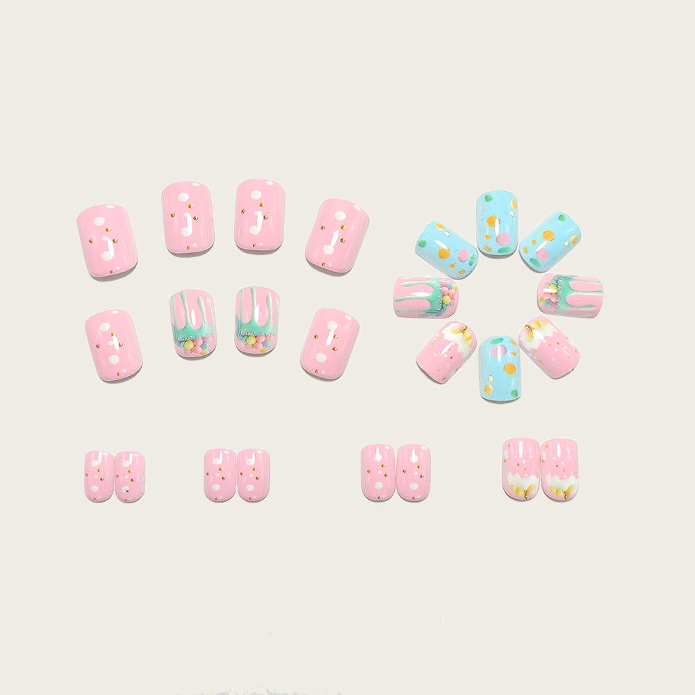 Artificial nails with playful cupcake design Bowlift