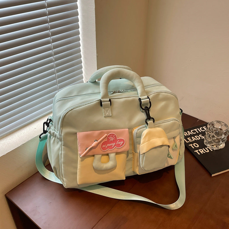 Multi-Compartment Travel Duffle Bowlift