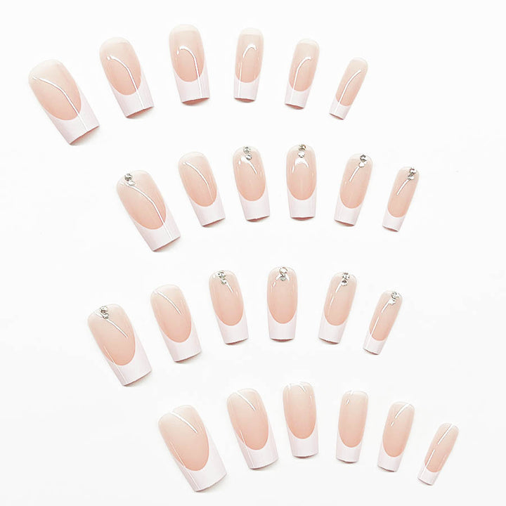 Elegant artificial nail set with high-gloss finish and rhinestone decorations Bowlift
