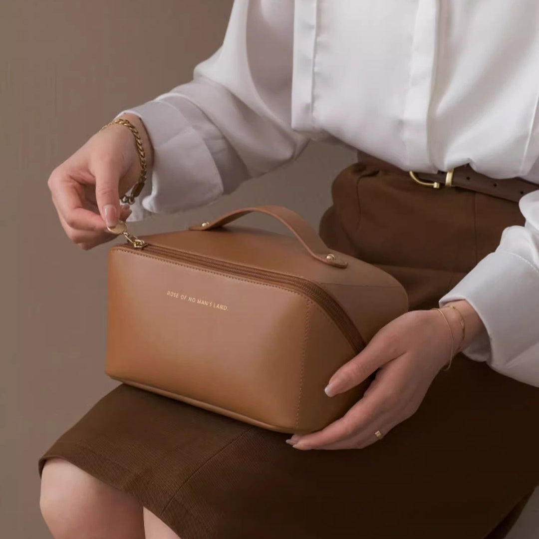 Cosmetic bag with multiple compartments and elegant design Bowlift
