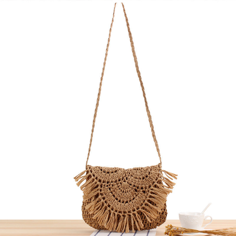 Handcrafted macrame shoulder bag with fringed design Bowlift