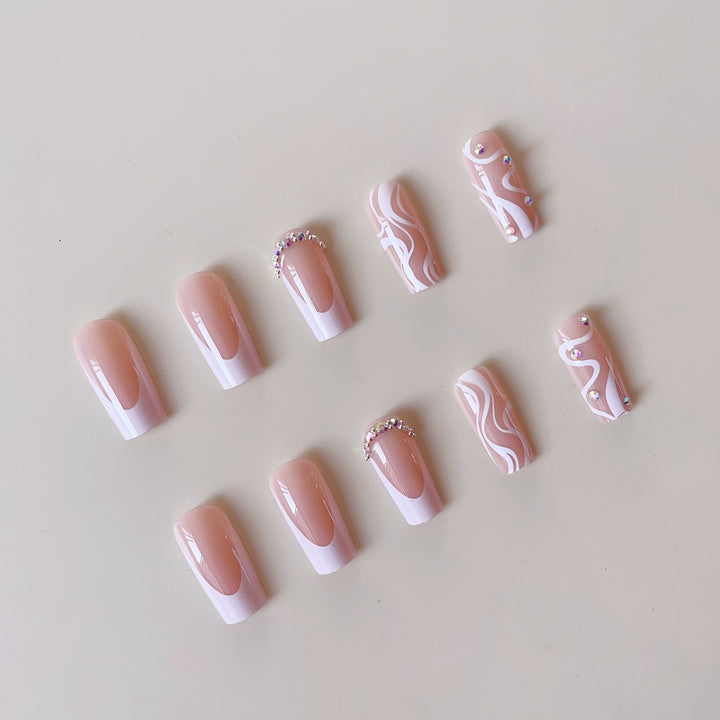 Artificial nail set with elegant French design and creative accents Bowlift