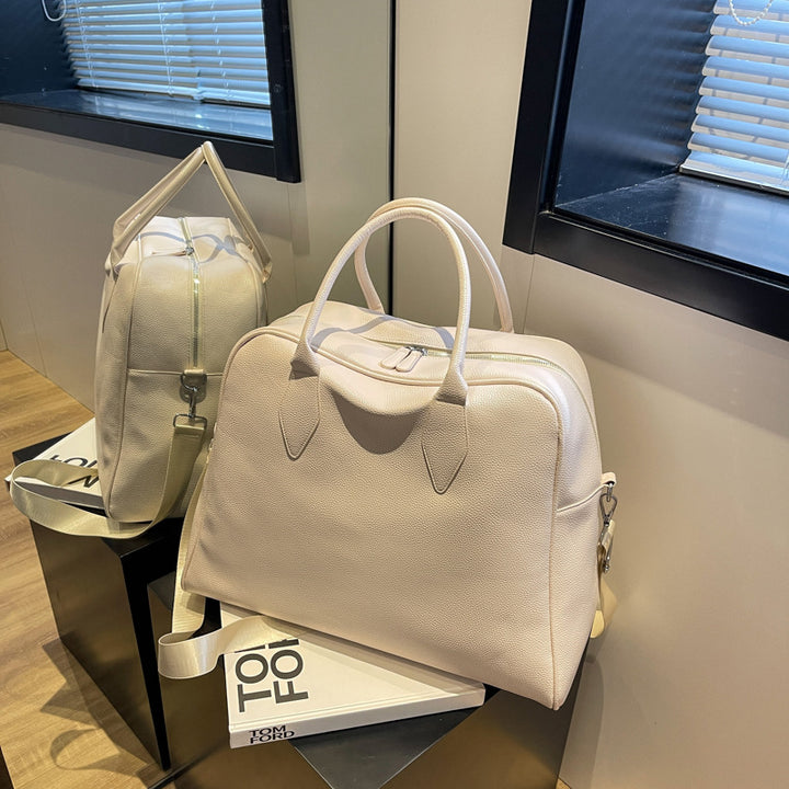 Stylish and Spacious Travel Bag with Versatile Carrying Options Bowlift