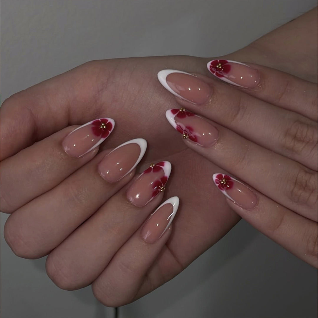 Artistic stiletto nails with luxurious floral design Bowlift