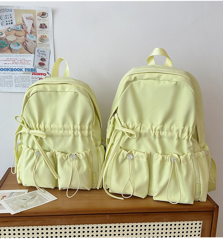 City backpack with innovative compartment system and adjustable carrying straps Bowlift