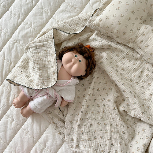 Unisex Muslin Blanket with delicate floral design and elegant ruffles Bowlift