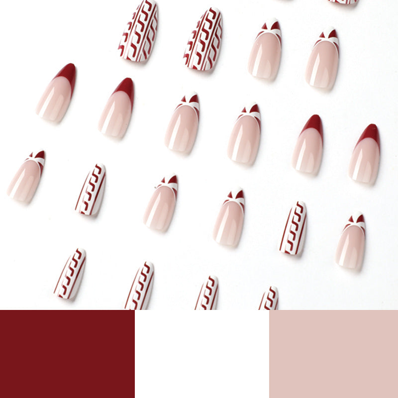 Elegant artificial nails in festive winter design Bowlift
