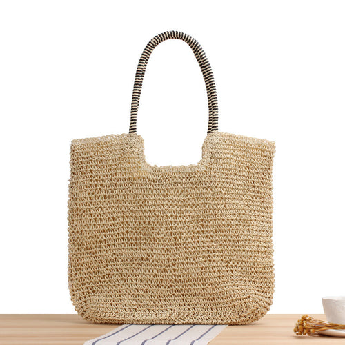 Handmade straw shoulder bag with structured design Bowlift