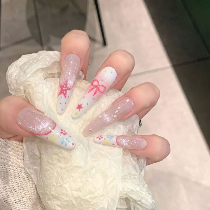 Artistic Press-On Nail Art Set with Charming Star and Bow Designs Bowlift