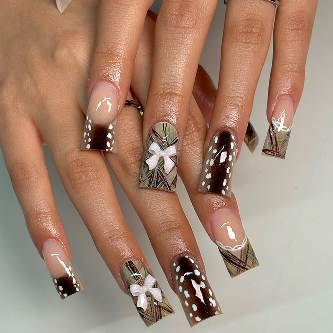 Artificial nails with elegant bow and pattern design Bowlift