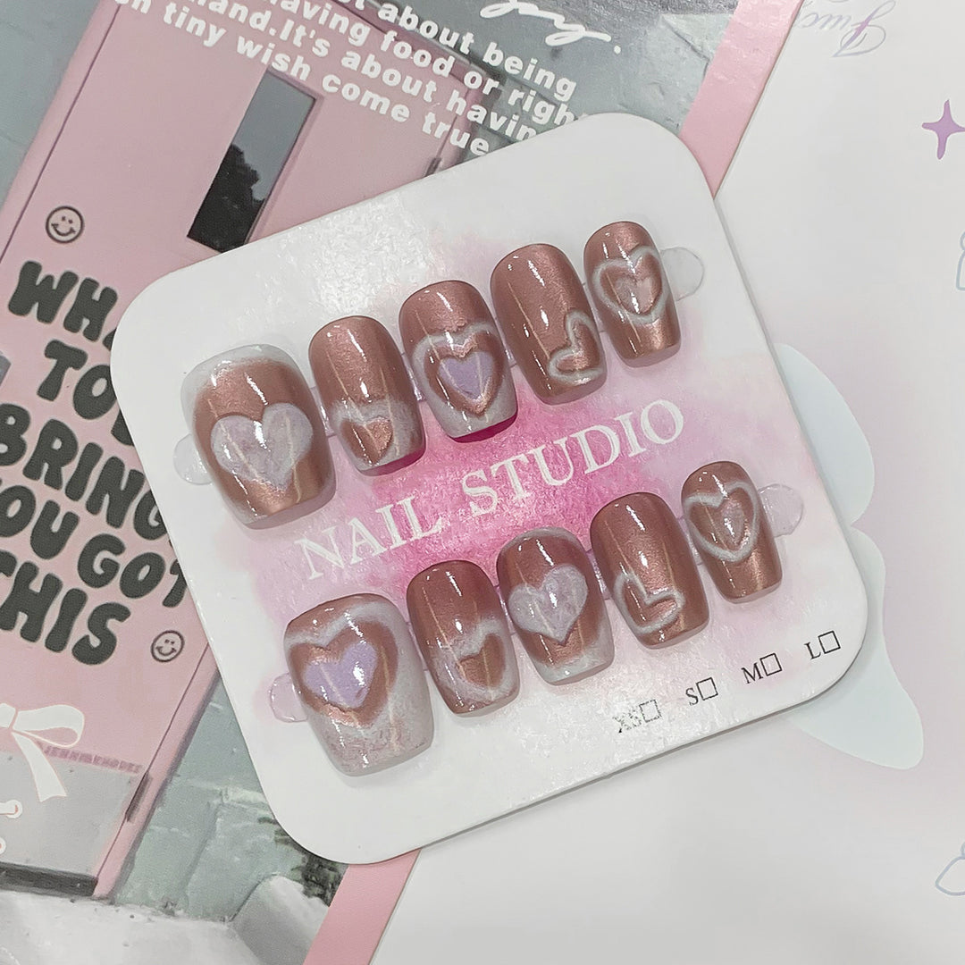 Artificial nail tips in heart design Bowlift