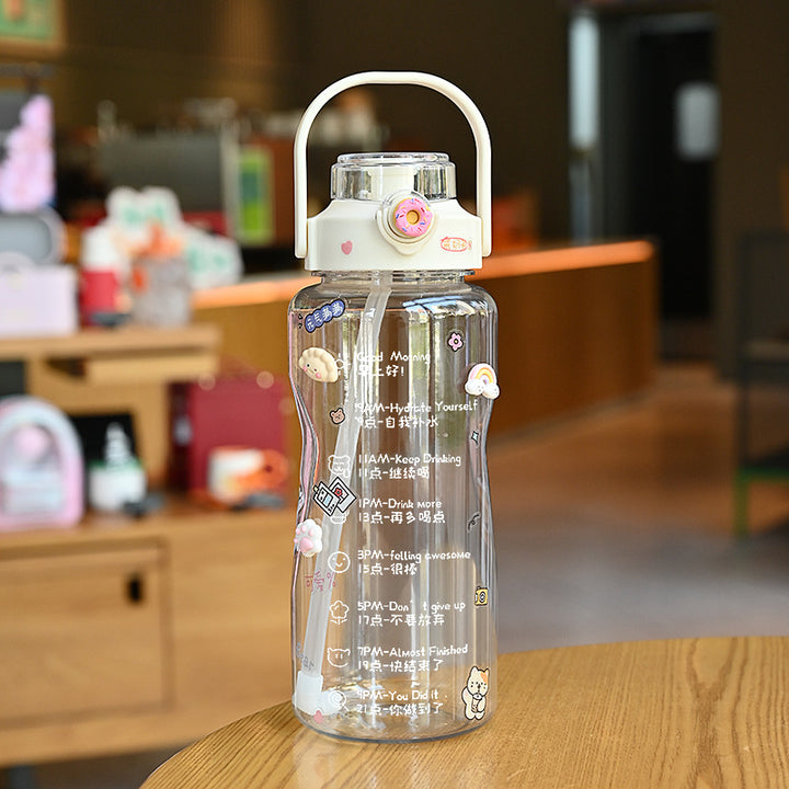 Women’s water bottle with integrated time marking and practical carrying handle Bowlift