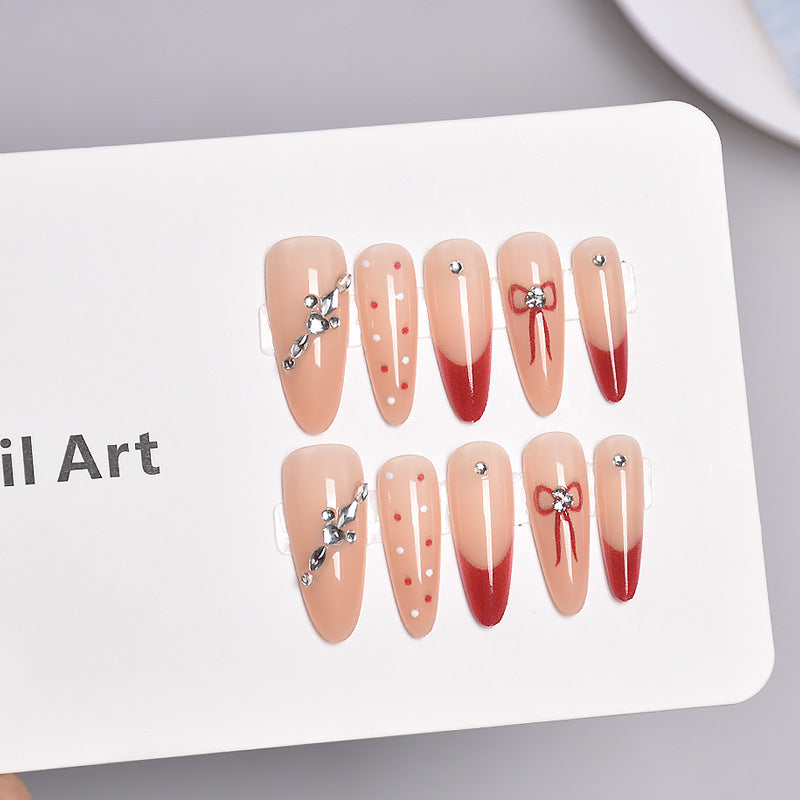 Artistic Press-On Nail Extensions with Decorative Patterns Bowlift