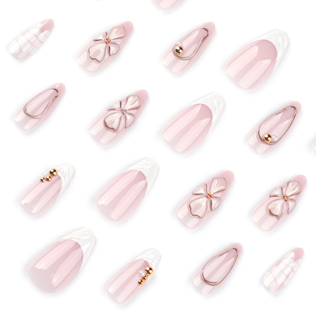 Artful stiletto nails with floral and shimmering decor Bowlift