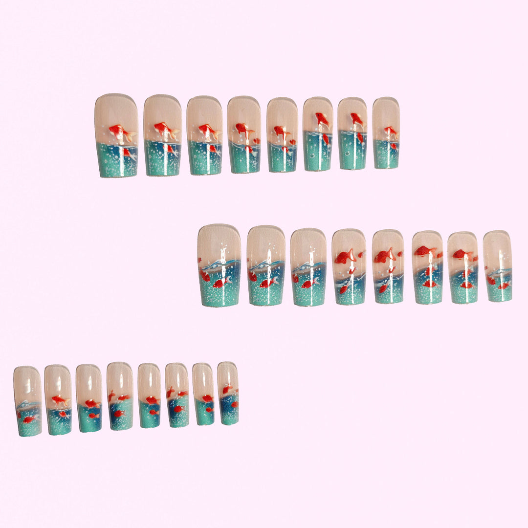 Artifical nails with maritime goldfish design Bowlift