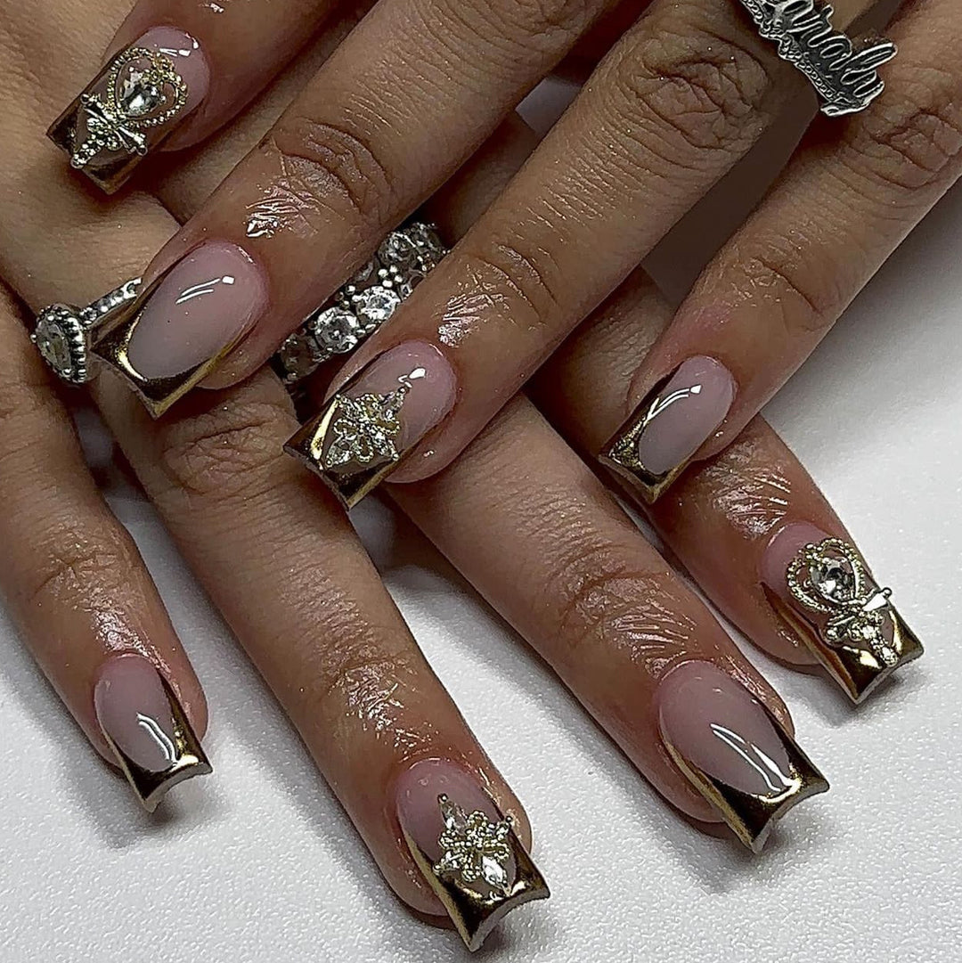 Artful Nail Extensions with Gold Accents Bowlift