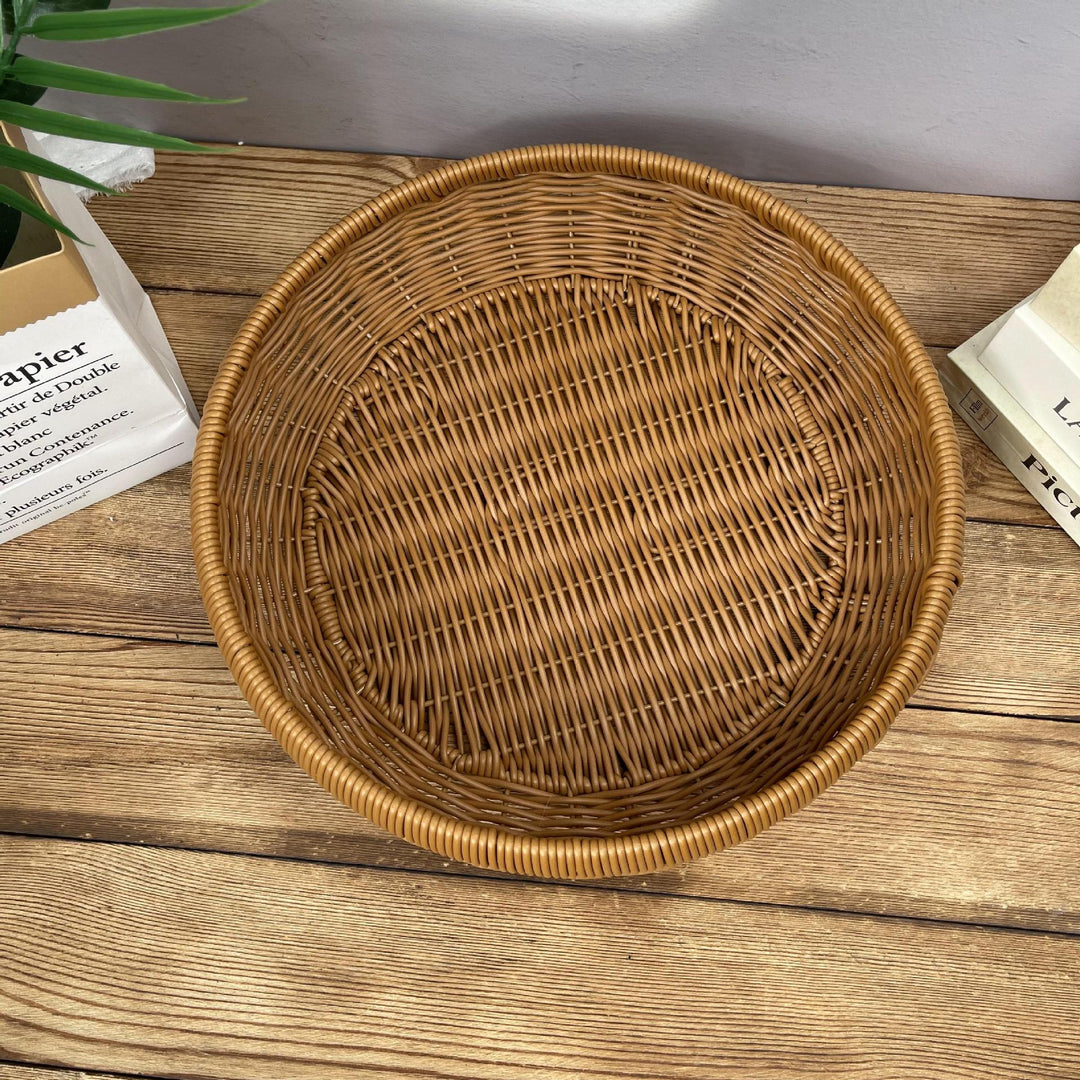 Women’s round serving basket made of woven rattan Bowlift