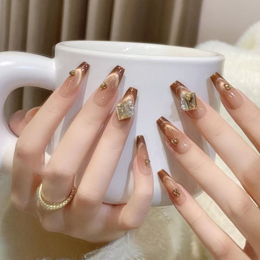 Artificial nails with elegant ombre effect and exquisite gemstones Bowlift
