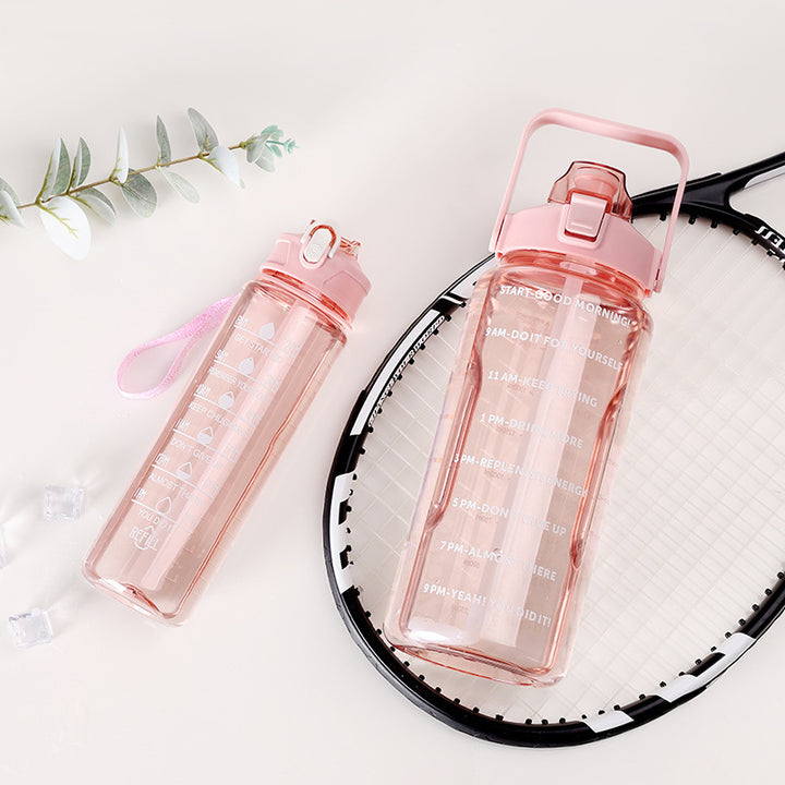 Women's motivation water bottle with integrated time markings and ergonomic design Bowlift