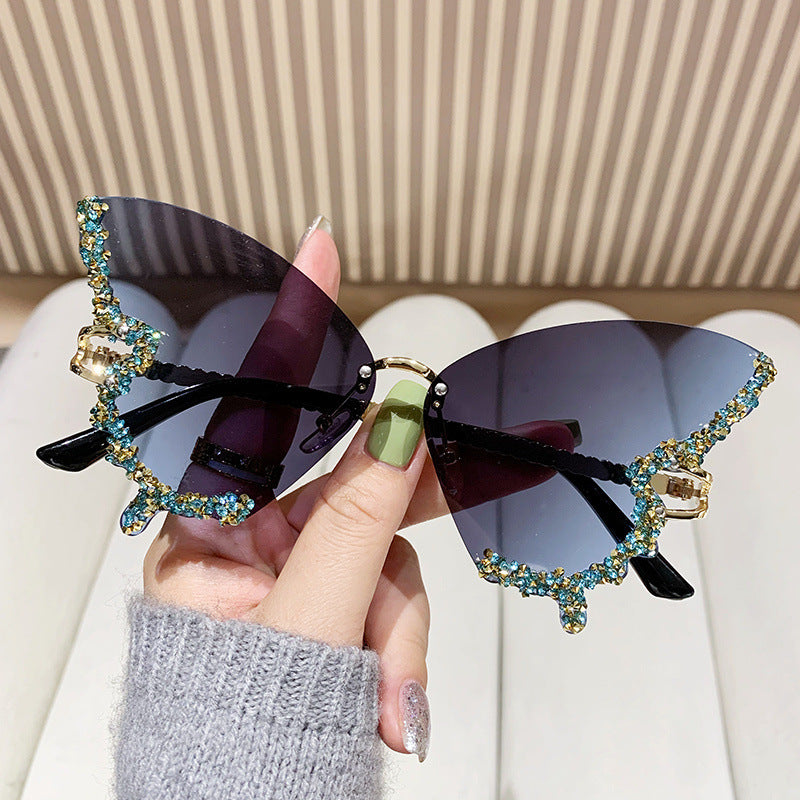 Women's extravagant sunglasses with sparkling butterfly design Bowlift