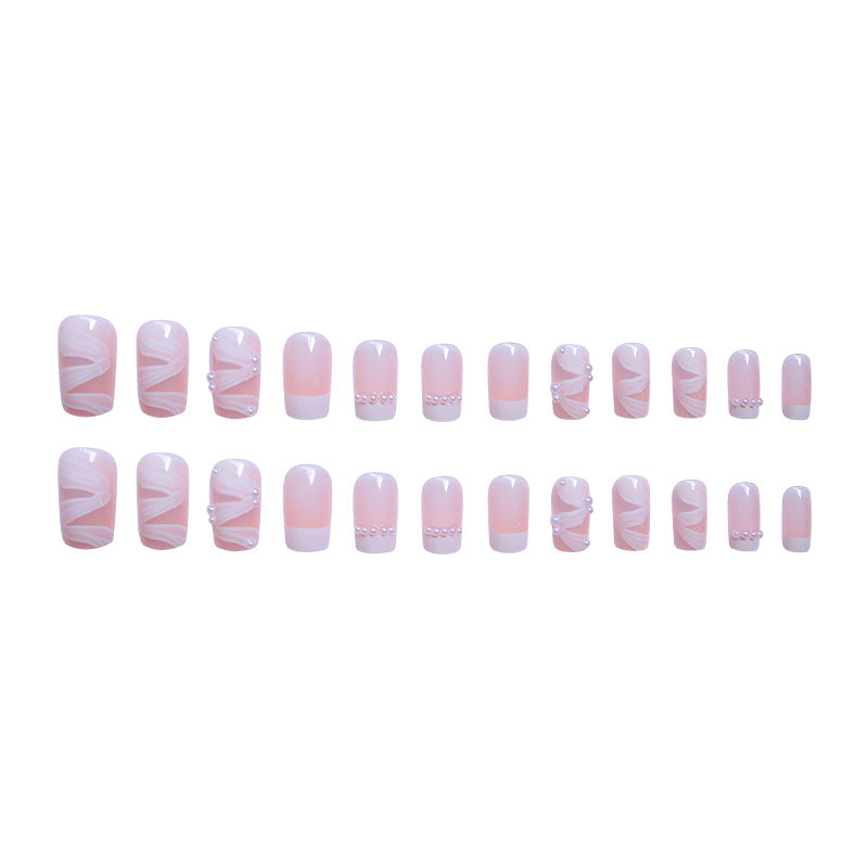 Elegant artificial nail set with stylish wave pattern and pearl accents Bowlift