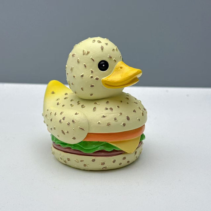 Funny rubber duck in hamburger design Bowlift