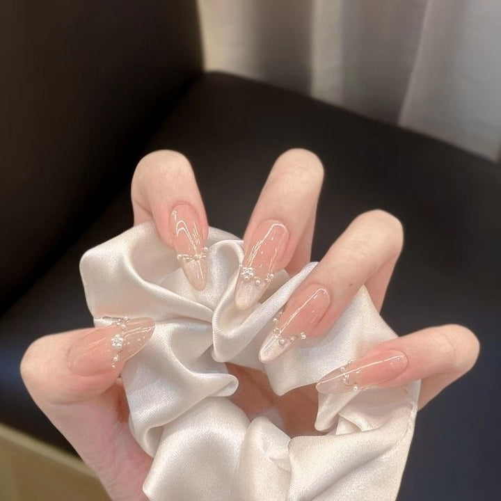 Artistic Nail Design with Decorative Elements Bowlift