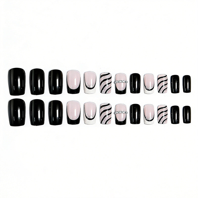 Elegant artificial nails with glitter and stripe accents Bowlift