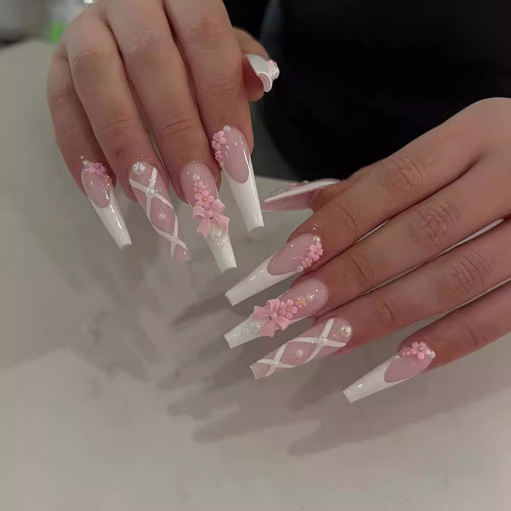 Artful and Elegant Stiletto Artificial Nails with Floral Design Bowlift