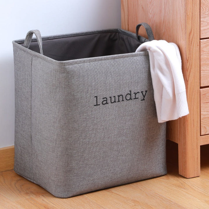 Laundry basket with practical carrying handle and modern design Bowlift