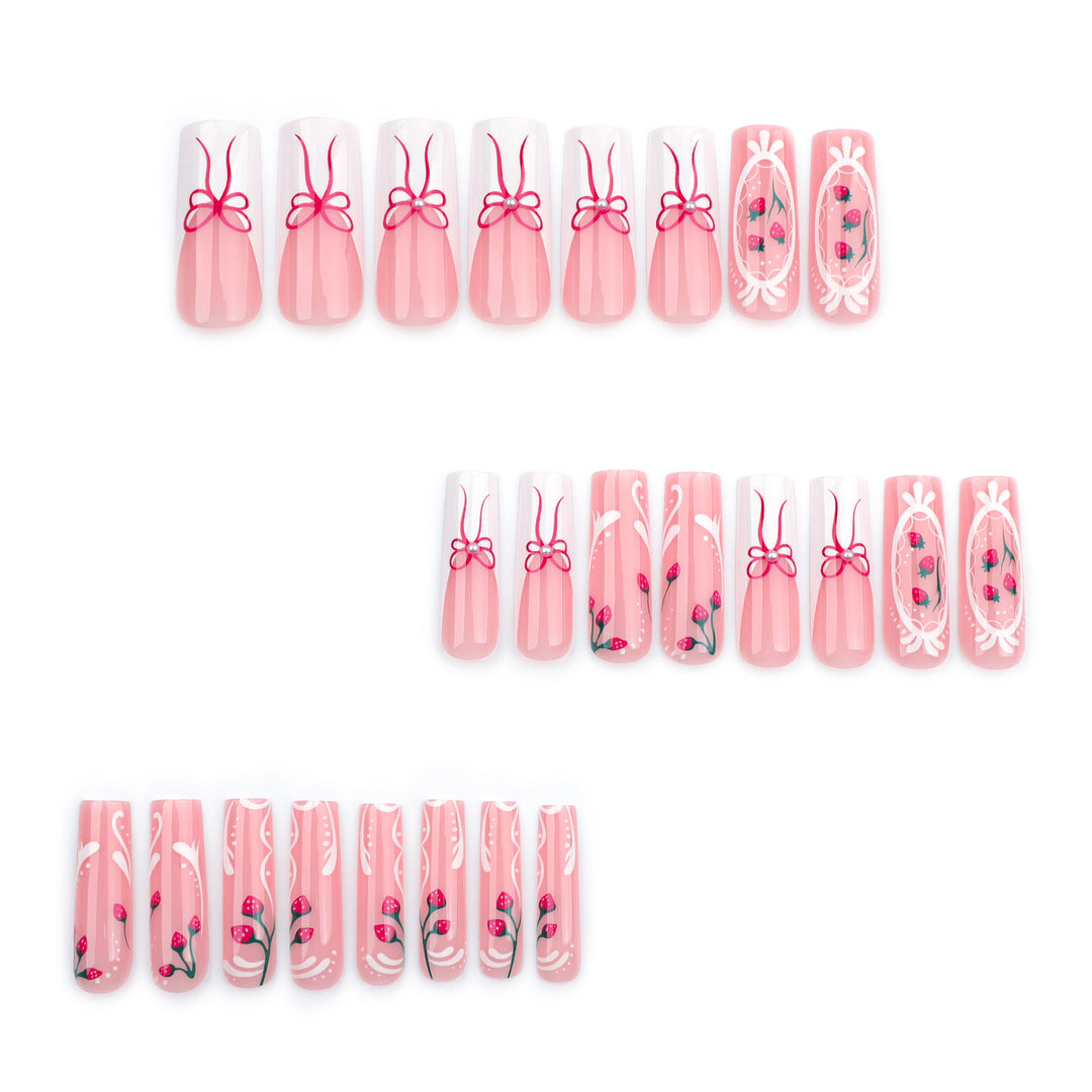 Artful nails with strawberry motifs and bow accents Bowlift