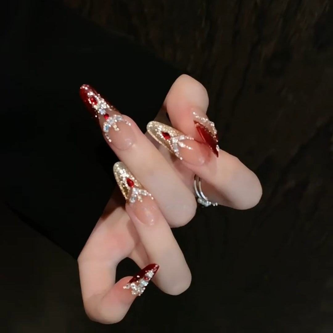 Artificial nail tips with sparkling crystal embellishments Bowlift