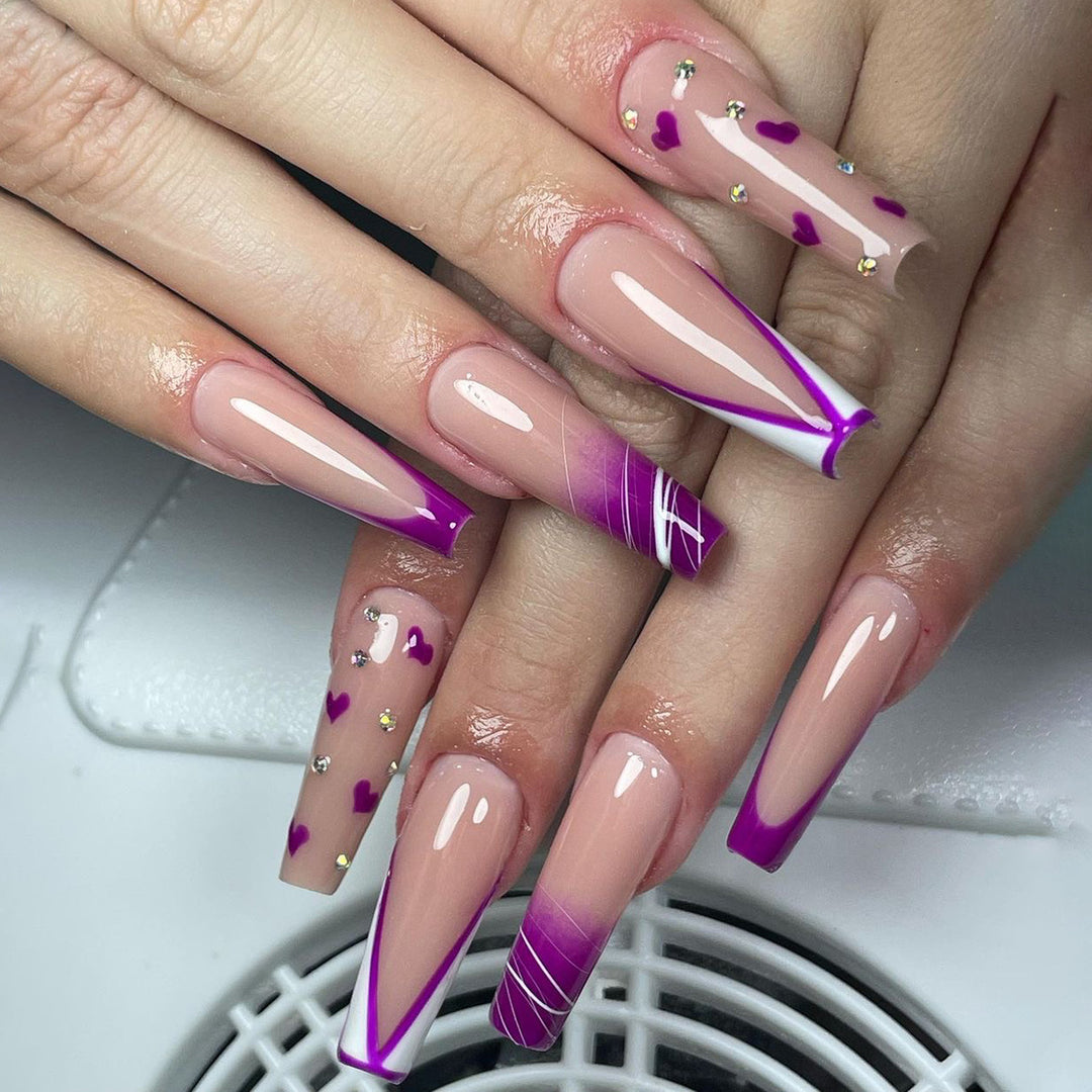 Artistic Gel Nails with Hearts and Gradient Bowlift
