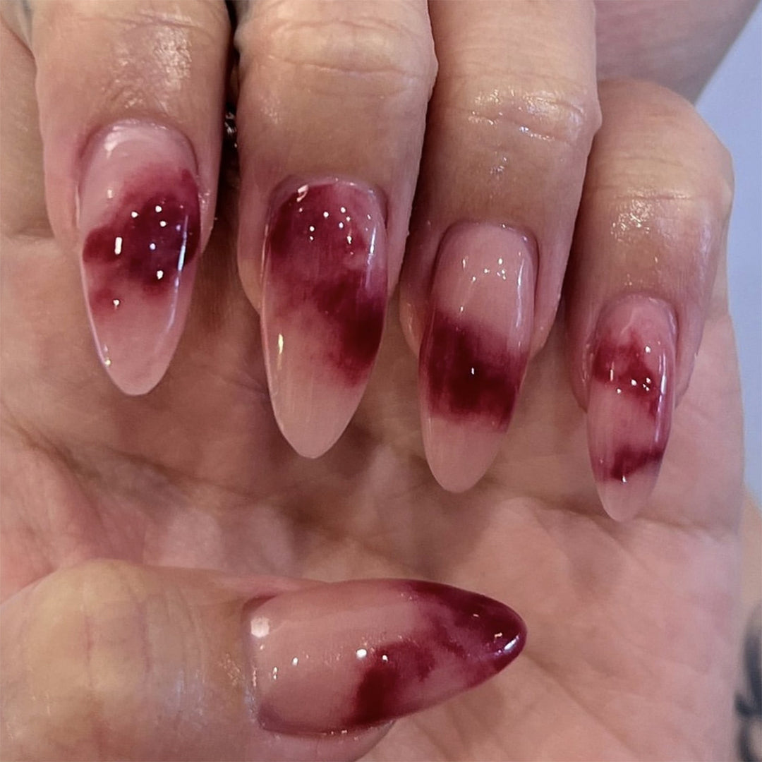 Artistic stiletto nails with glamorous gradient Bowlift