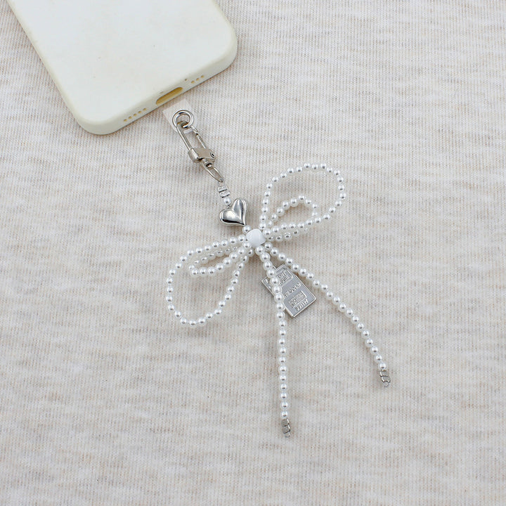 Elegant Beaded Bow Brooch Bowlift