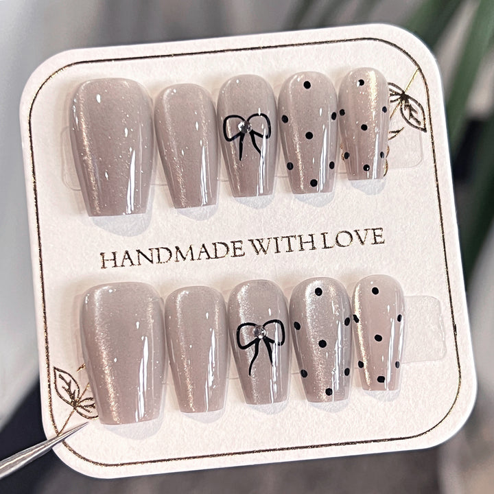 Artful Nail Extensions with Colorful Bow Motifs Bowlift