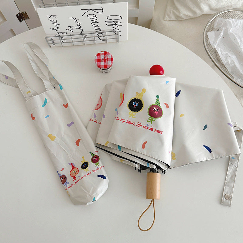 Women Folding Umbrella with Playful Cartoon Designs Bowlift