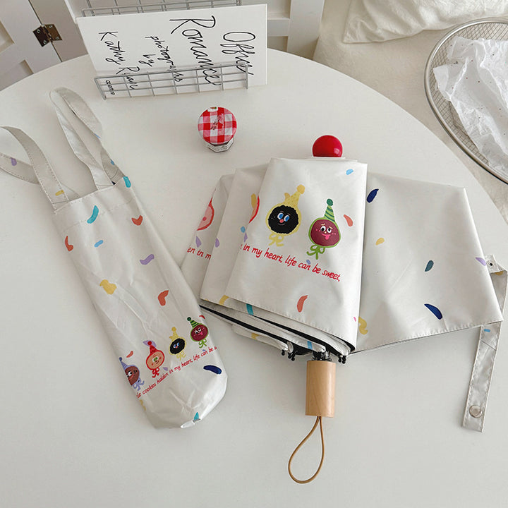 Women Folding Umbrella with Playful Cartoon Designs Bowlift