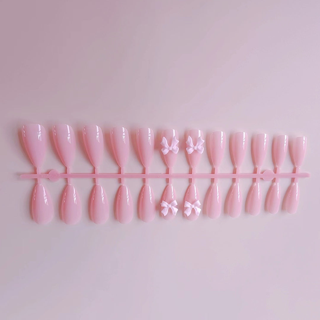 Artificial nails with elegant bow accents Bowlift