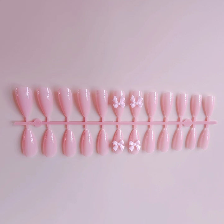 Artificial nails with elegant bow accents Bowlift