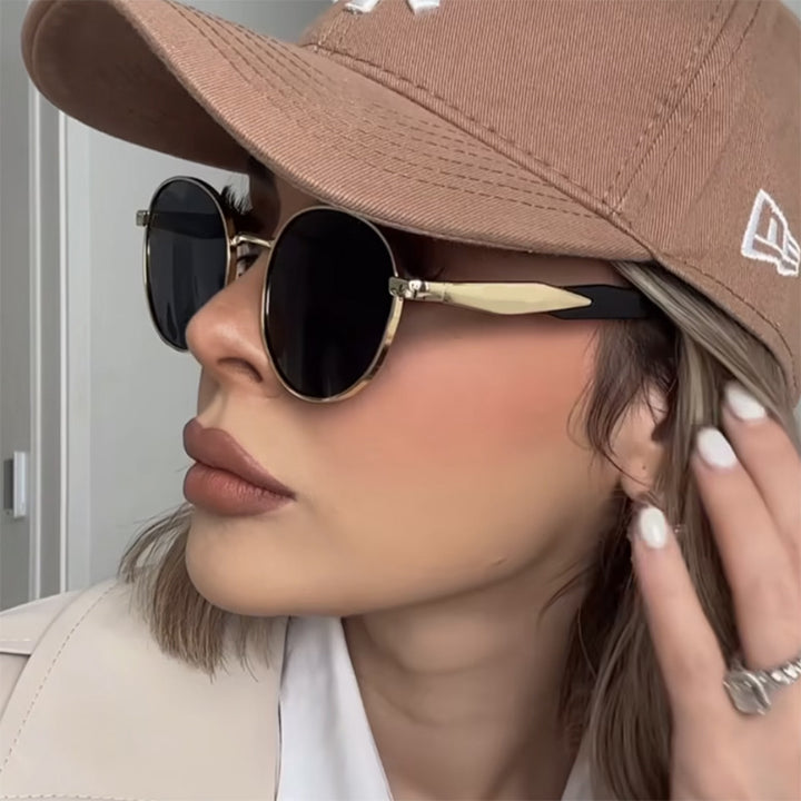 Women's round sunglasses with elegant, golden frame and UV protection Bowlift