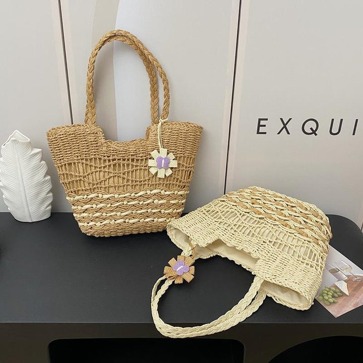 Handwoven beach bag with floral accents Bowlift