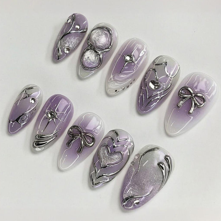 Nail art set with elegant flower and glitter accents Bowlift