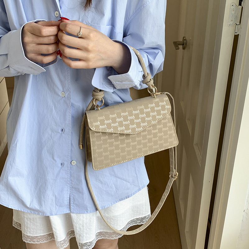 Elegant Monogrammed Handbag Bowlift