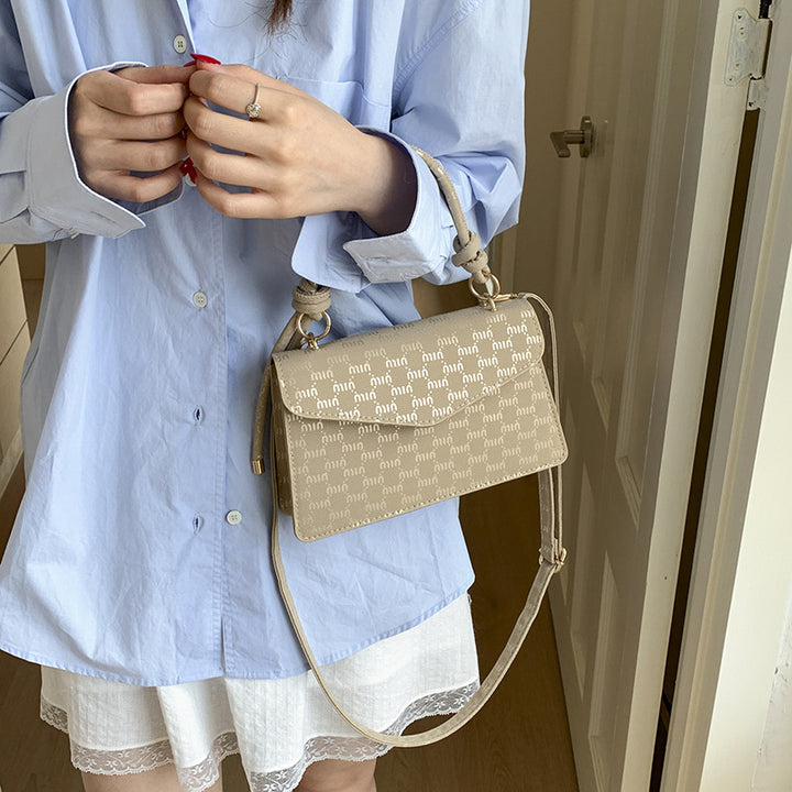 Elegant Monogrammed Handbag Bowlift