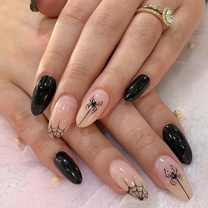Artistic nail art with spider motif Bowlift