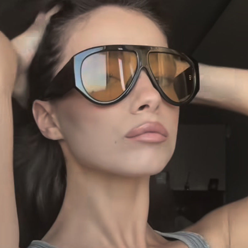 Ladies fashionable sunglasses in modern design with wide frame Bowlift
